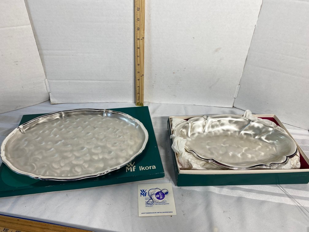 PAIR OF SERVING PLATTERS THAT ARE SILVER PLATED