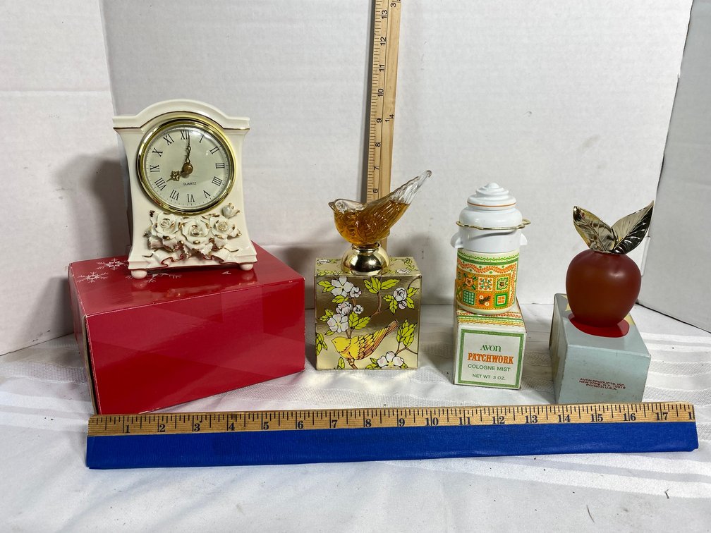 COLLECTION OF FOUR AVON CONTAINERS IN THEIR ORIGINAL BOXES