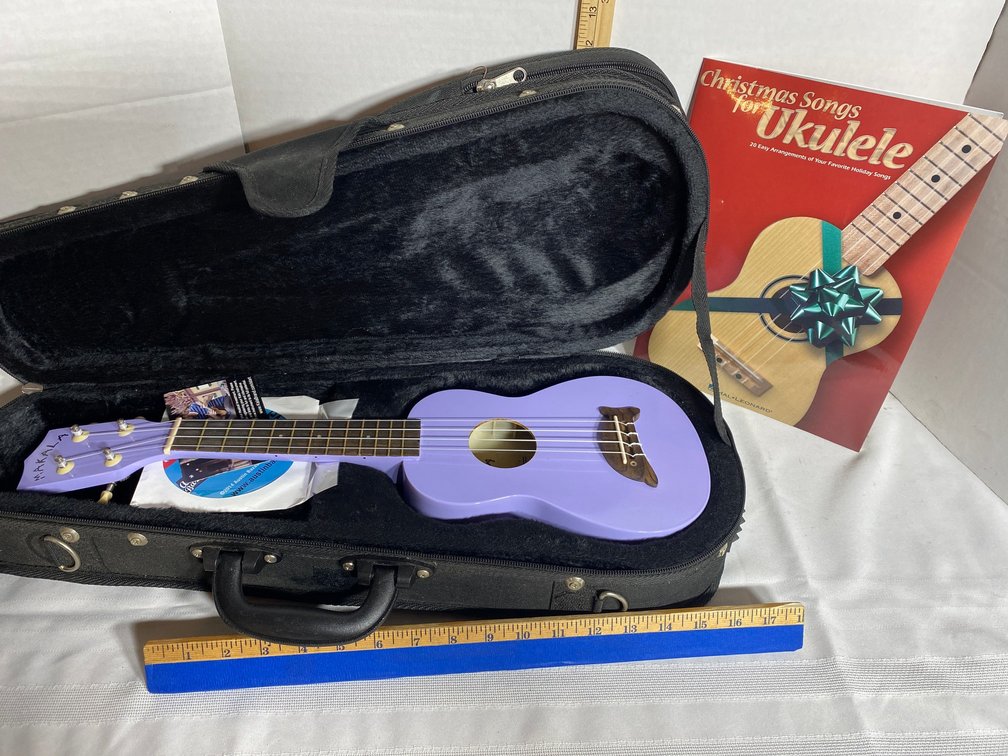 PURPLE UKULELE IN CASE