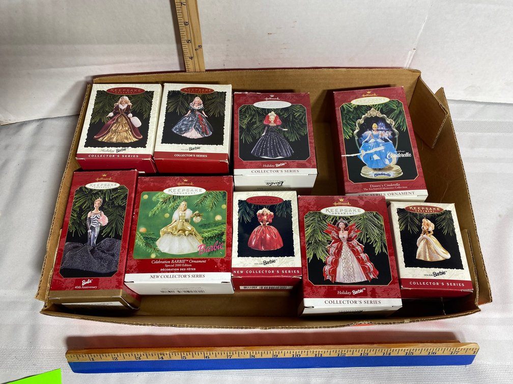 COLLECTION OF NINE BARBIE-THEMED HALLMARK KEEPSAKE ORNAMENTS