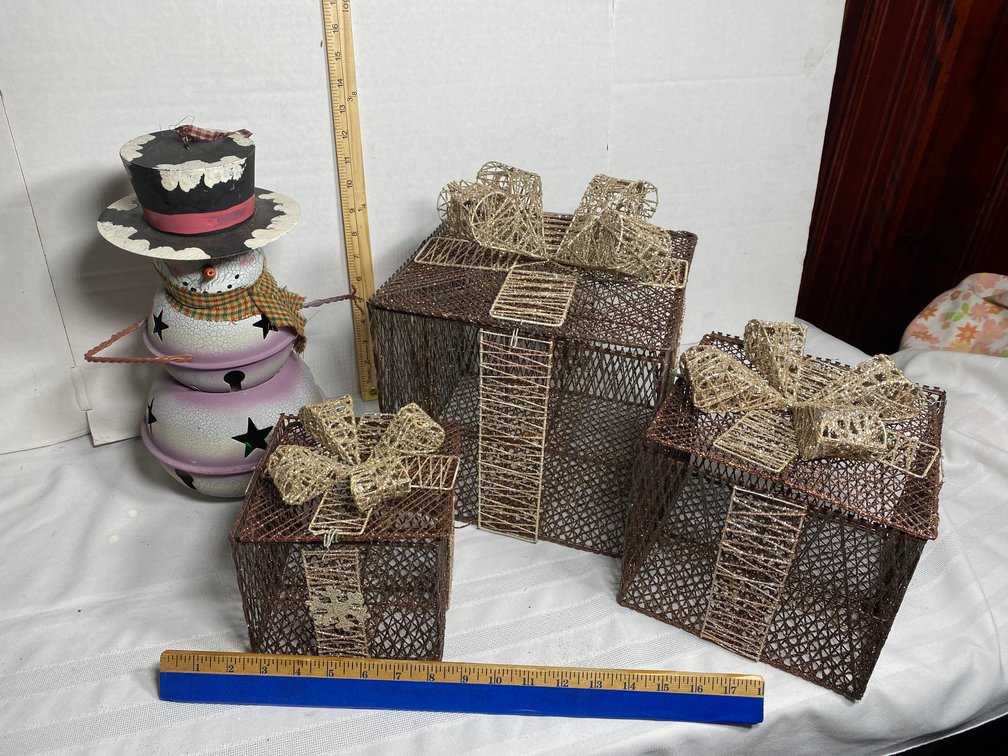 THREE DECORATOR PRESENTS AND A METAL SNOWMAN THAT IS 13 INCHES TALL