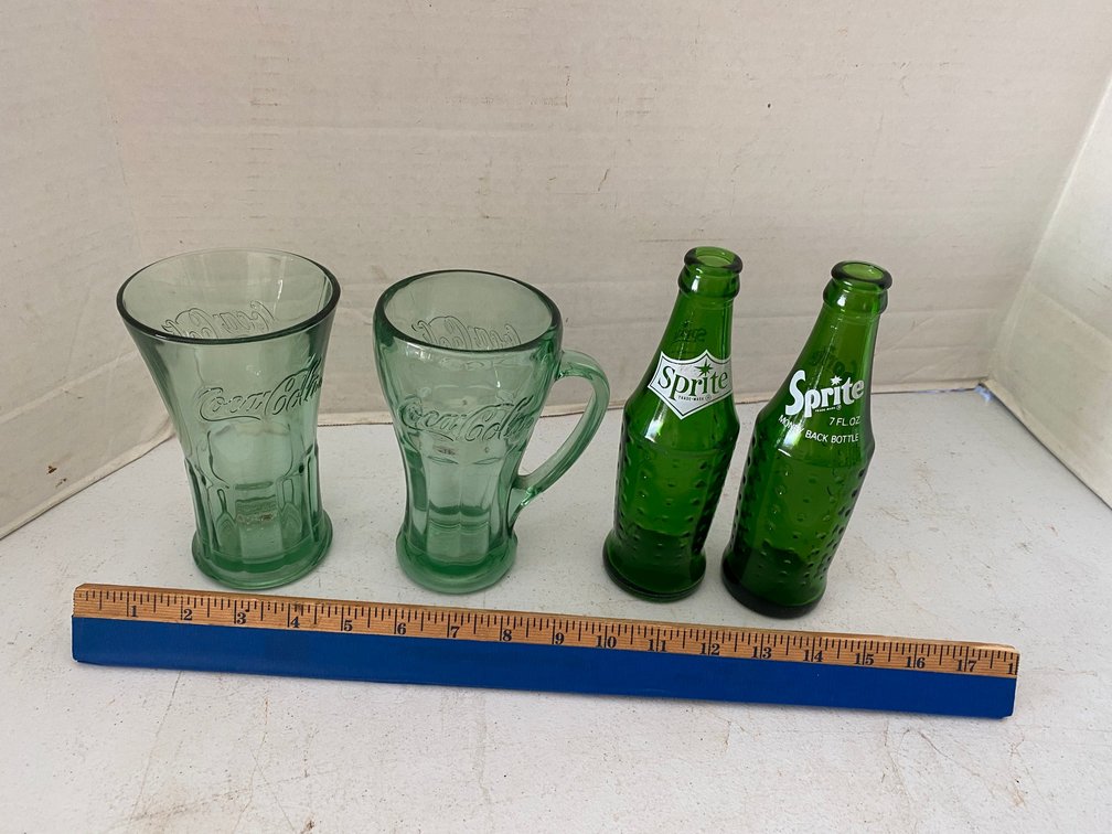 TWO GLASS COCA-COLA GLASSES AND TWO GLASS SPRITE BOTTLES