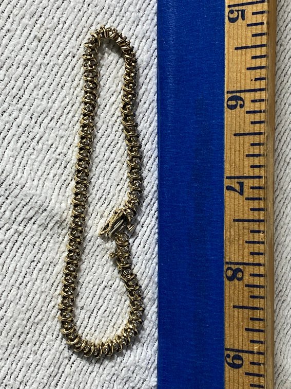 14 KARAT BRACELET WITH POSSIBLE DIAMONDS