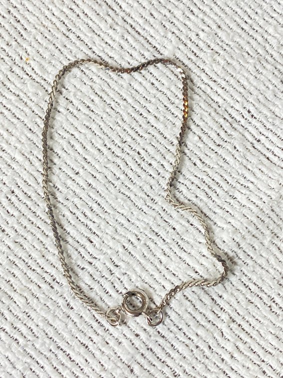 BRACELET MARKED STERLING 1.5 GRAMS SEVEN INCHES LONG