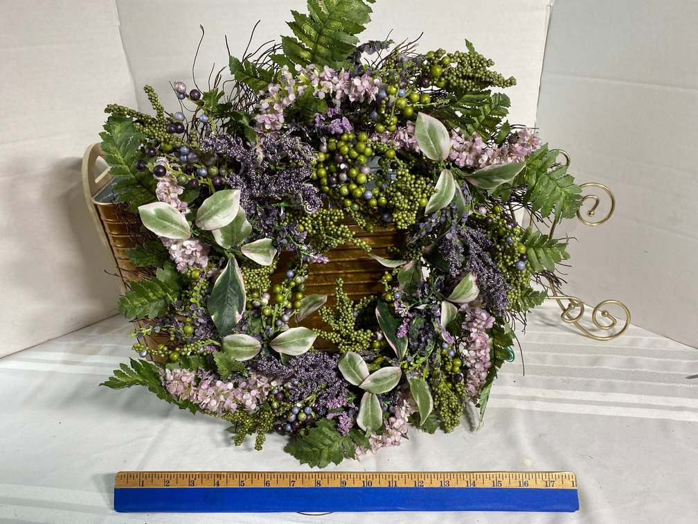 METAL BIN WITH FAUX FLORAL WREATH AND A METAL PICTURE STAND