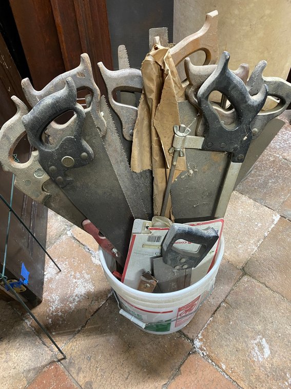 BUCKET OF HAND SAWS