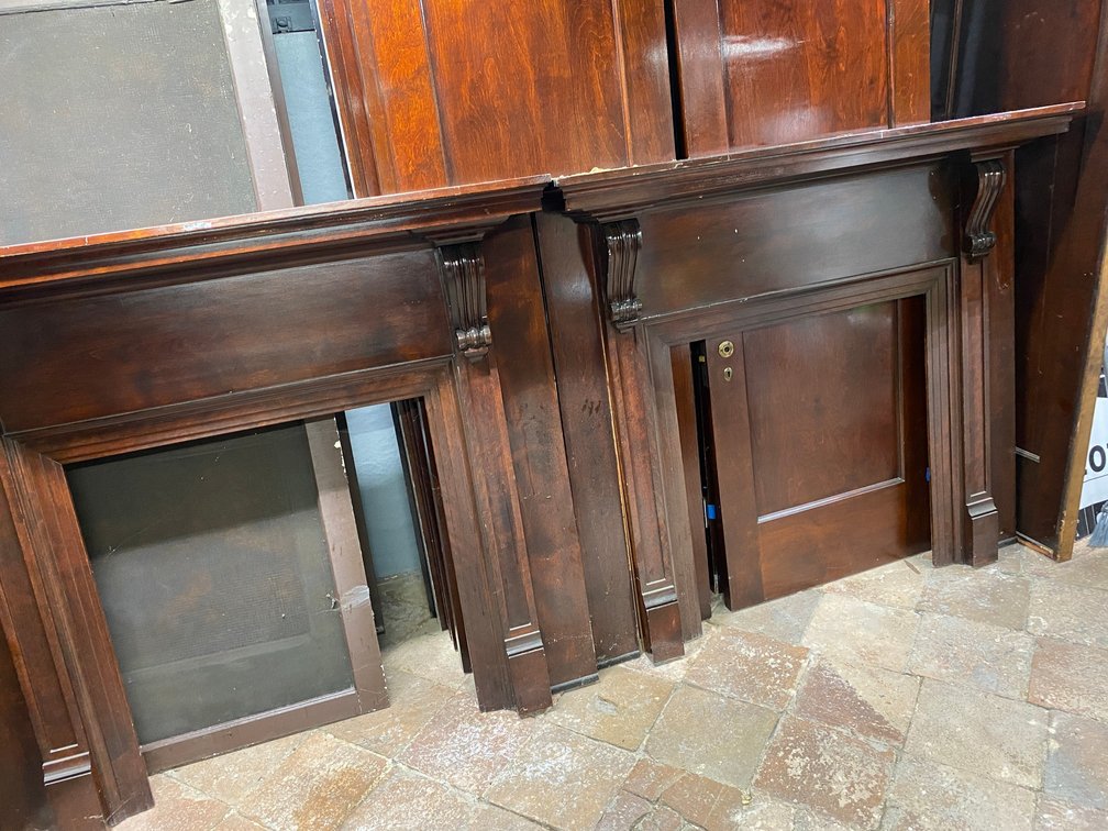 TWO ANTIQUE WOODEN MATCHING MANTLES