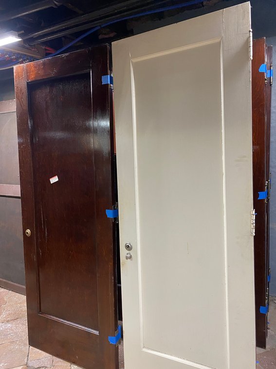 TWO ANTIQUE WOODEN DOORS