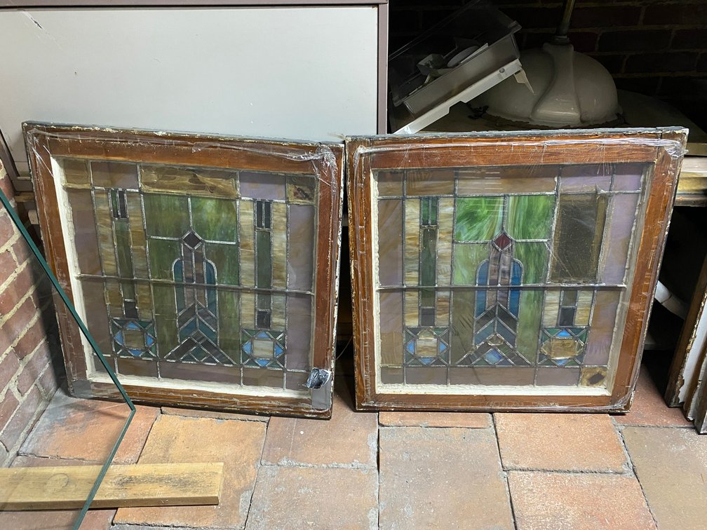TWO ANTIQUE STAINED GLASS WINDOWS WITH WOOD FRAMES