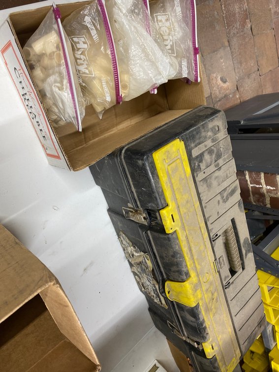 TOOLBOX WITH MANY PLASTIC PIPE FITTINGS