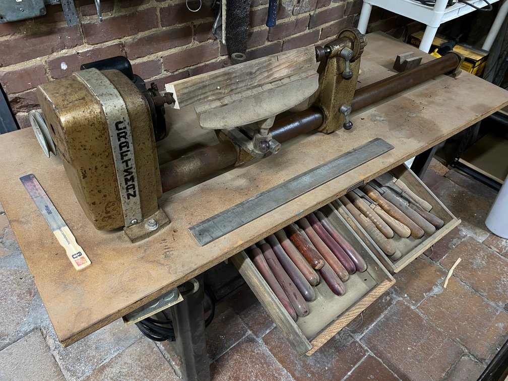 CRAFTSMAN WOOD LATHE MOUNTED ON A TABLE