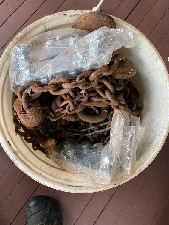 FIVE-GALLON BUCKET OF ASSORTED TIRE CHAINS AND TOW CHAINS