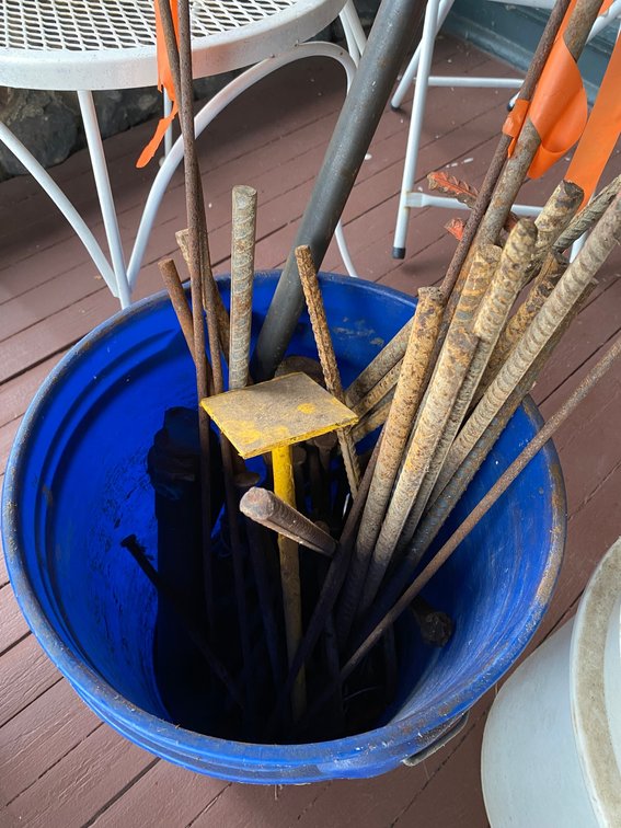 BUCKET OF REBAR PIECES