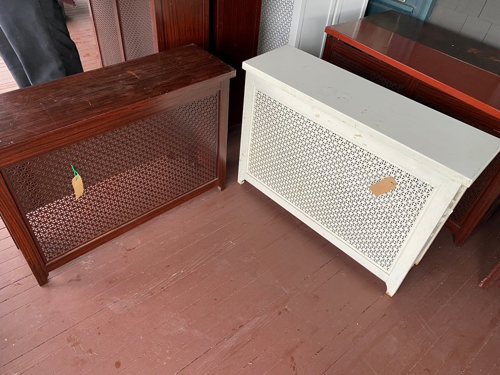 TWO ANTIQUE RADIATOR COVERS