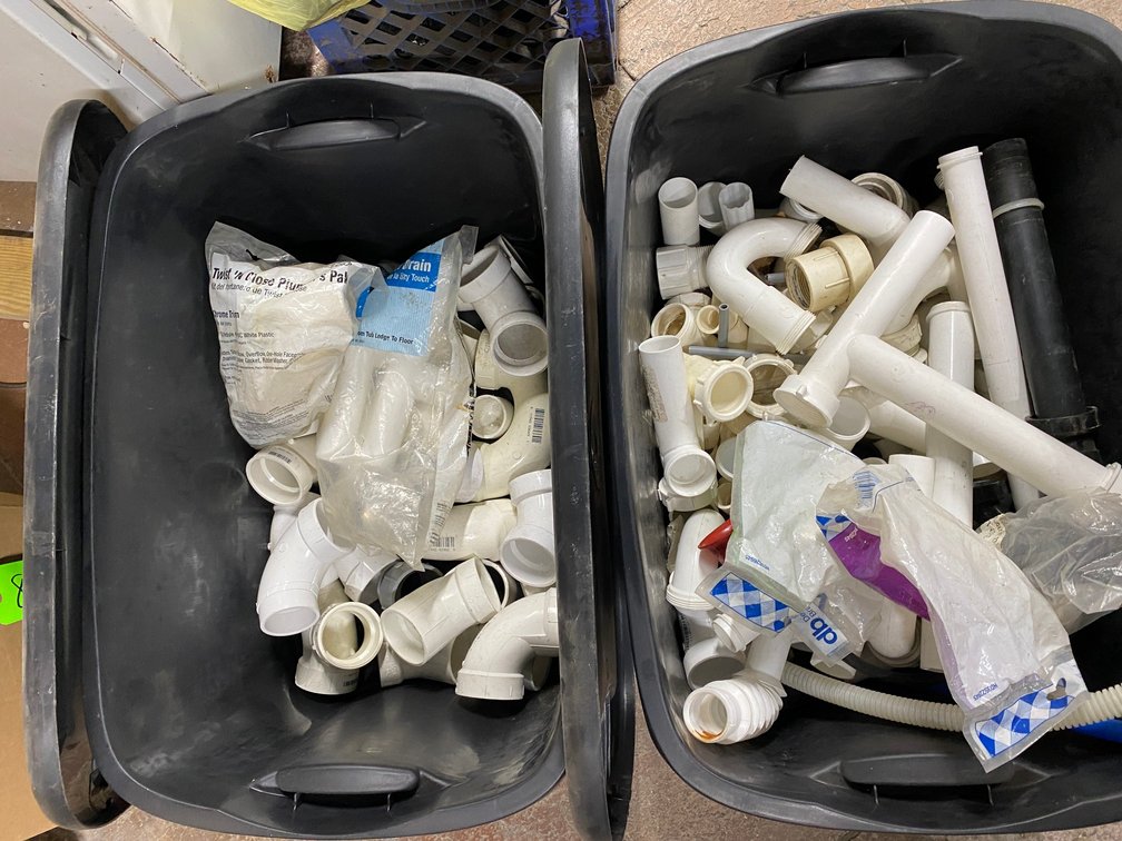 TWO TOTES OF PLASTIC PIPE FITTINGS AND COUPLERS