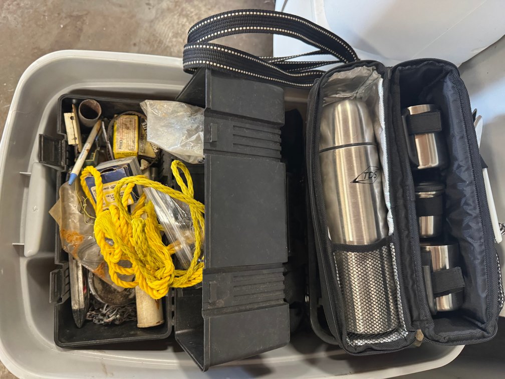 Tools, bags, thermos and rope
