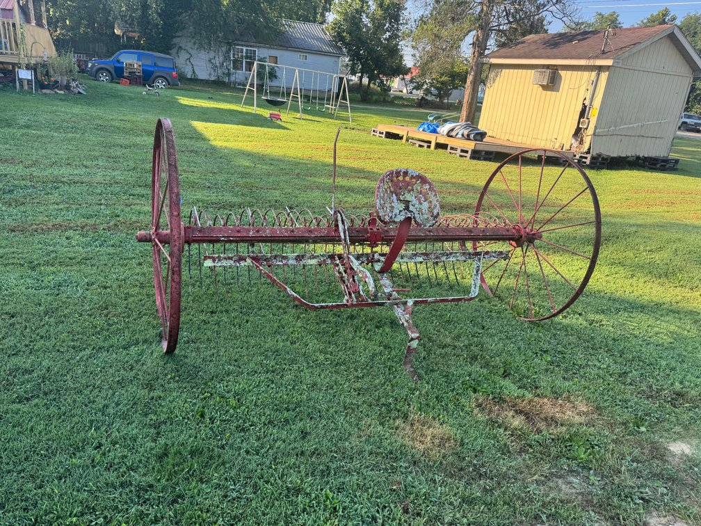 Antique horse-drawn hay rake