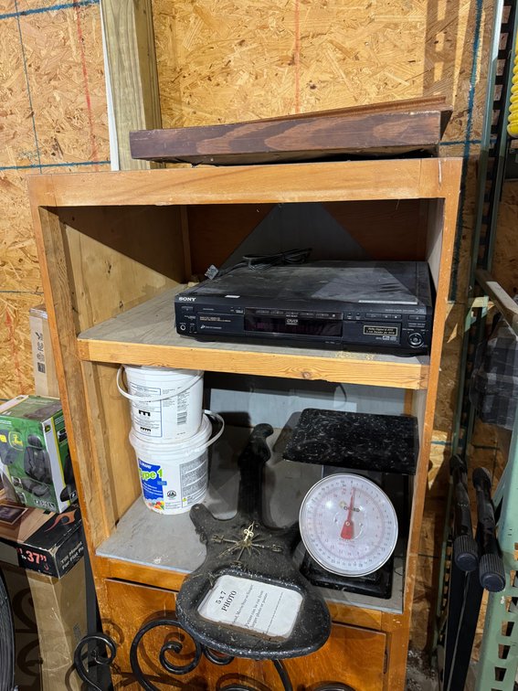 Storage cabinet with household items