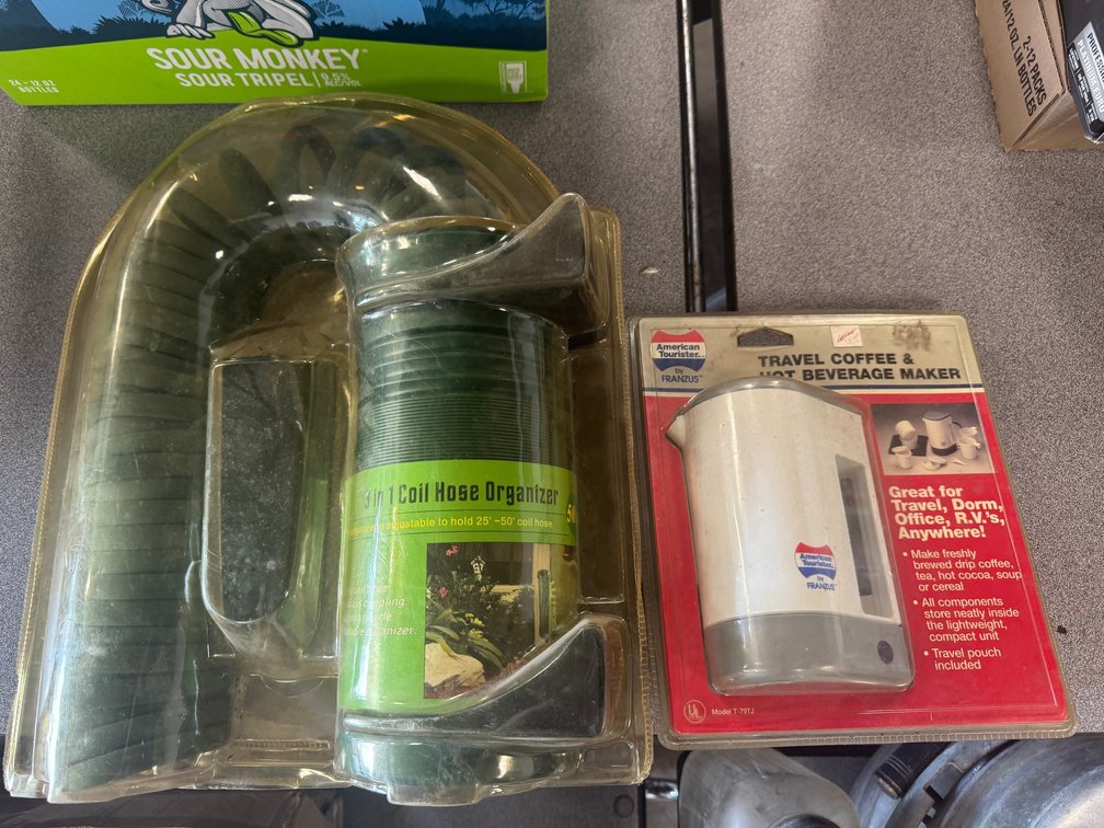 Hose organizer and travel beverage maker