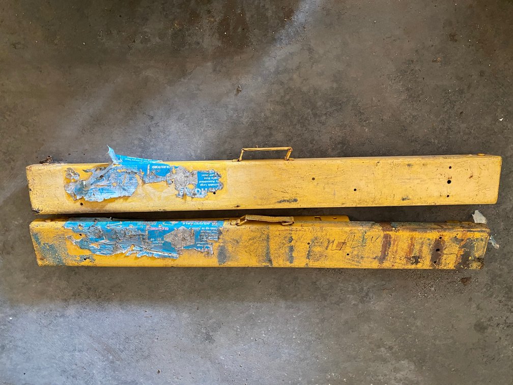 Pair of metal folding saw horses