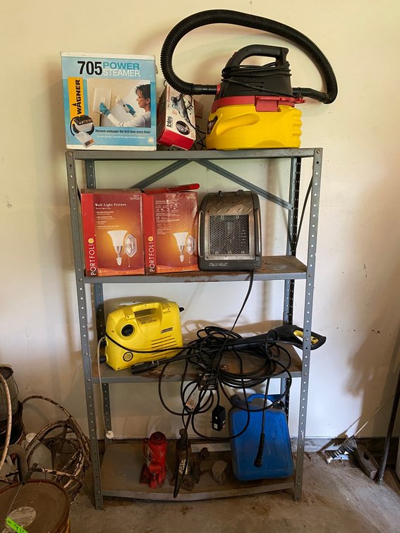 Shelf lot including the metal shelving unit