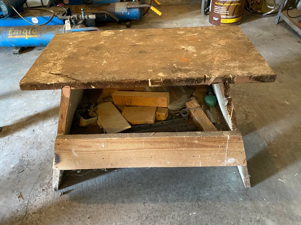 Custom made wooden bench with storage shelf