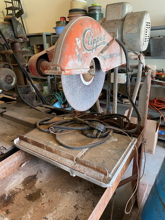 Clipper masonry saw, 230 volt, single phase, comes with extension cord and is mounted on a stand