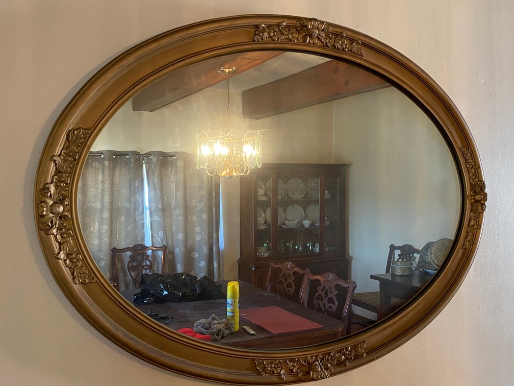 Oval wall mirror
