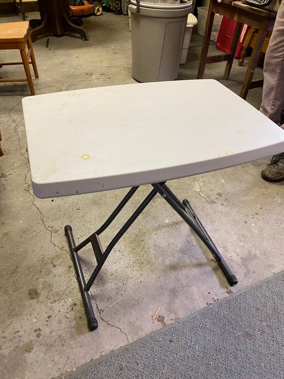 Plastic folding table
