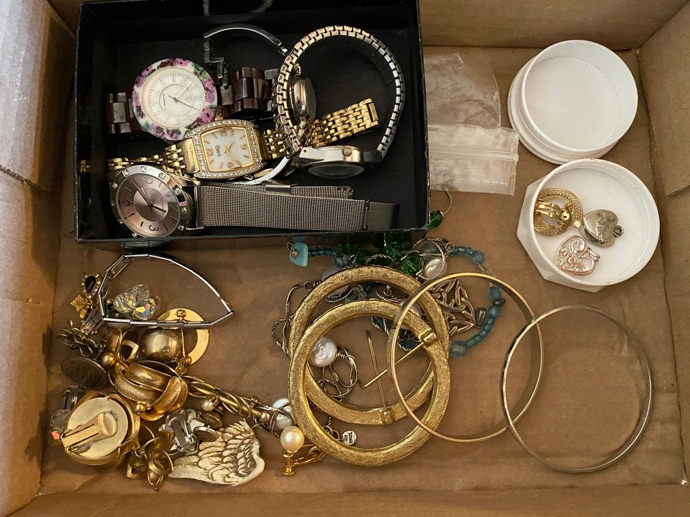 Watches, costume jewelry bracelets and necklaces