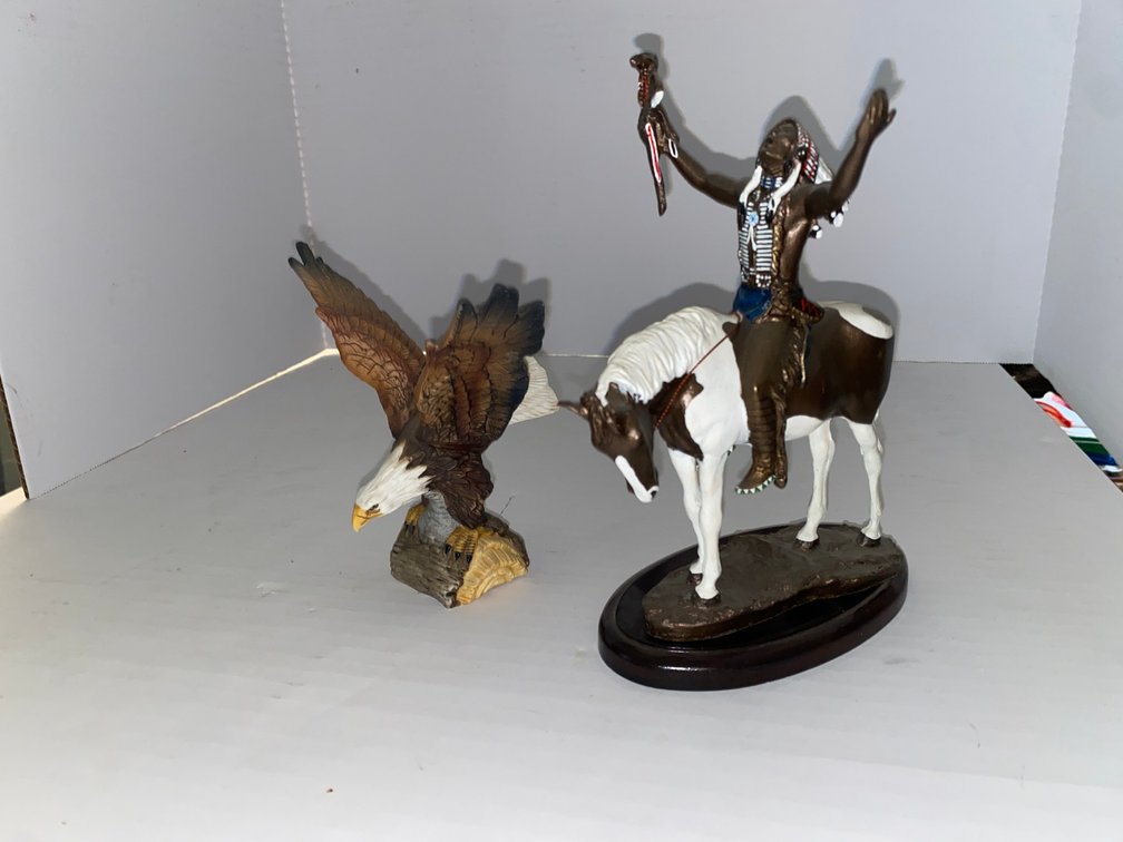 Two Figurines: "Deliverance" and an Eagle