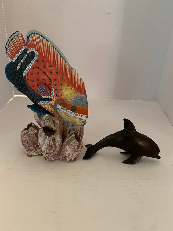 Two Figurines: Colorful Fish and a Dolphin
