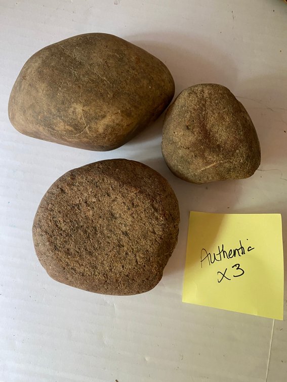 Three hammer head stones