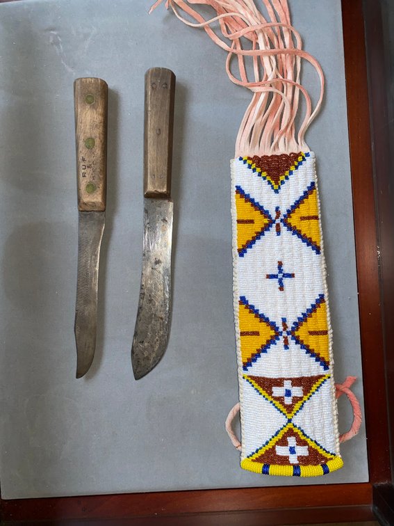 Two knives and beaded carrier