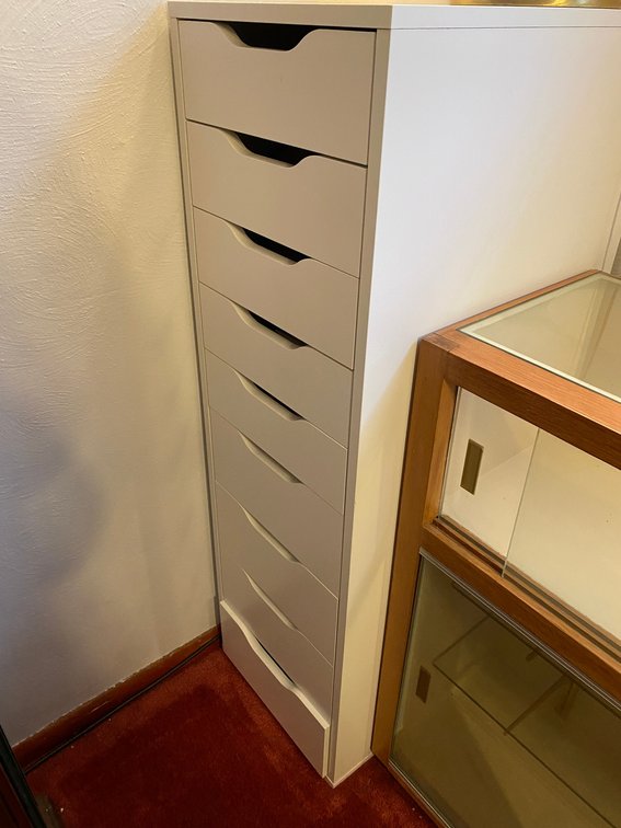 White Storage Cabinet with contents
