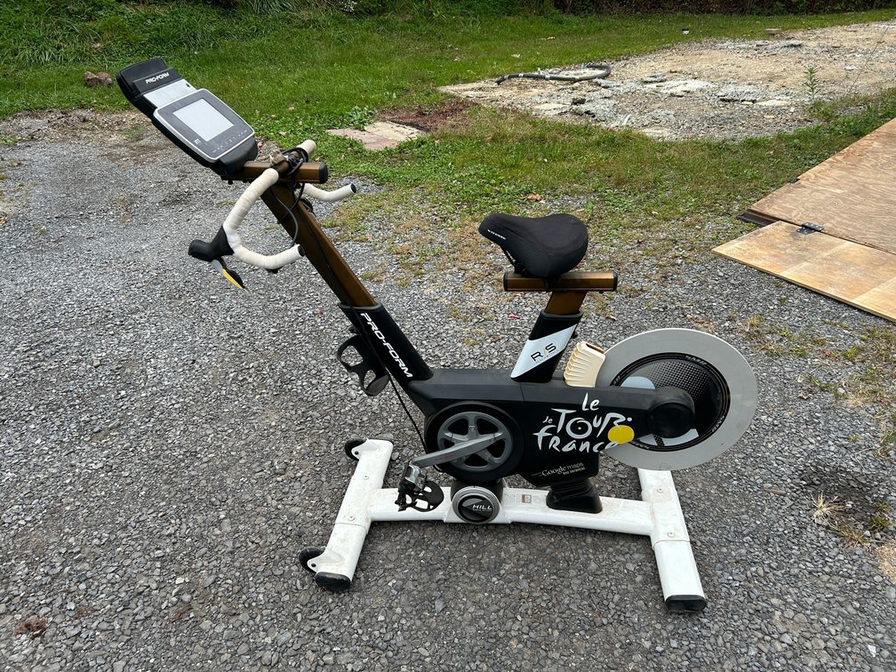 Tour de France upright indoor training bike with drop style handlebars, magnetic resistant wheel