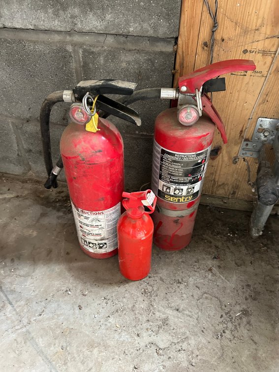 2 Fire extinguishers-smallest is a Firefighter dry chemical fire-both green
