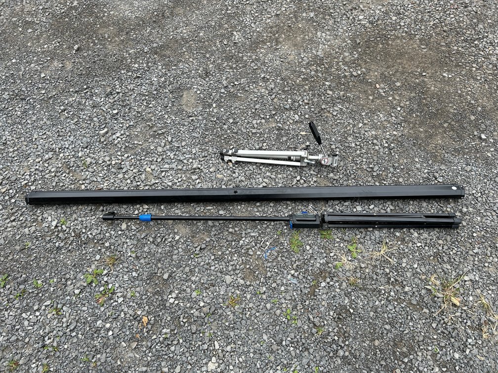Large projection screen with camera tripod