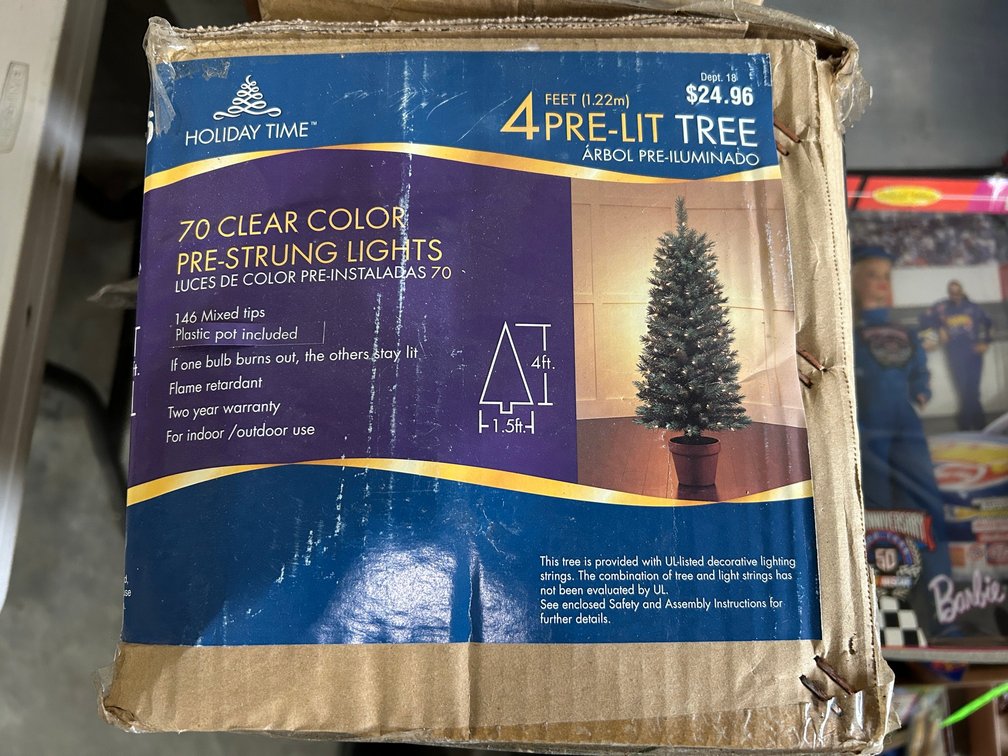 4' Tall pre-lit tree with 70 clear pre-strung lights