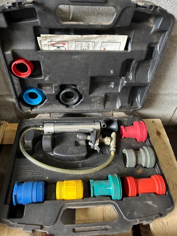 Cooling system pressure tester