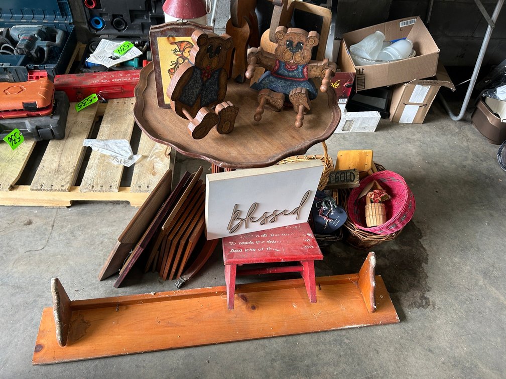 Small wooden table in need of repair, baskets, child's stool, wooden decorative items, framed prints