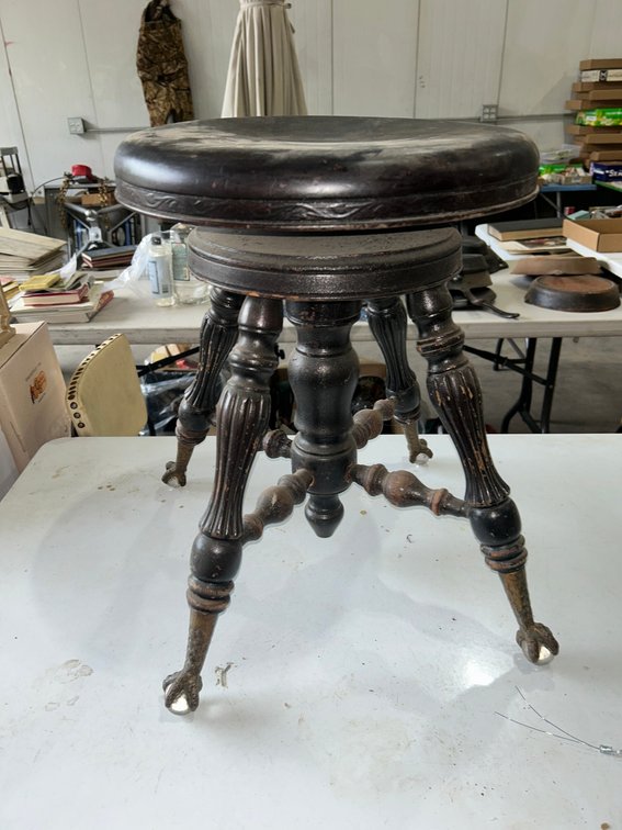 Antique organ stool with claw feet and glass balls