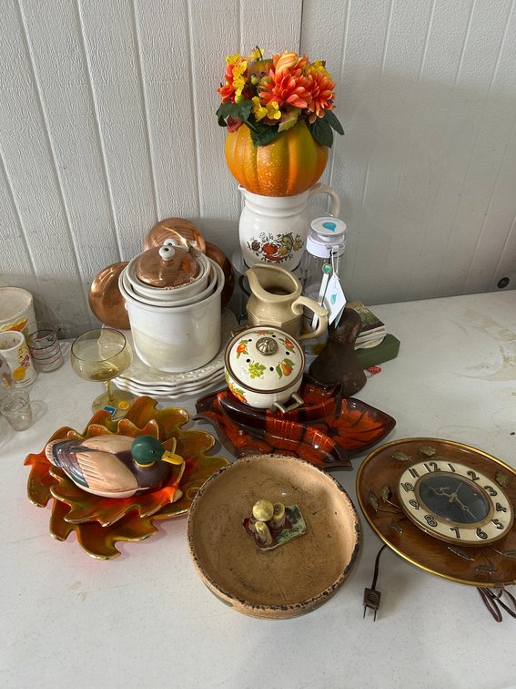 Plates, canister set, decorative items, clock