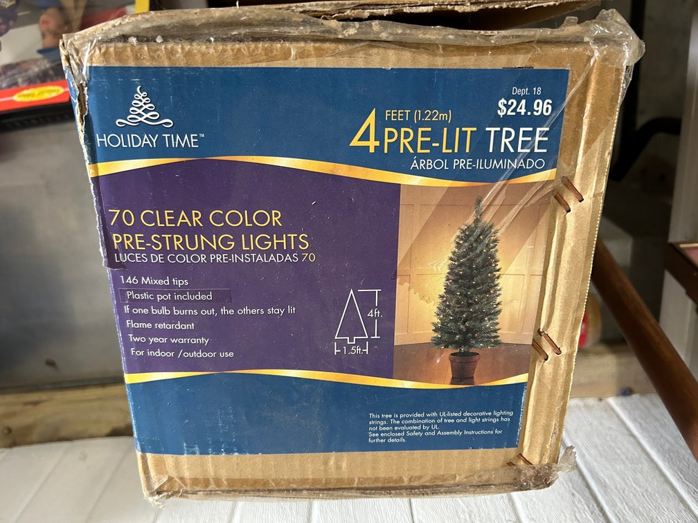 4' Tall pre-lit tree with 70 clear pre-strung lights