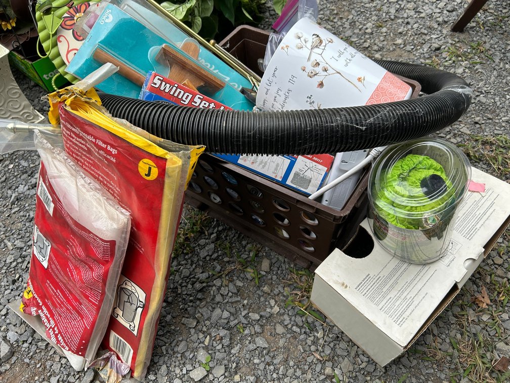 Pocket hose, vacuum bags, swingset leg anchors, wooden towel bars