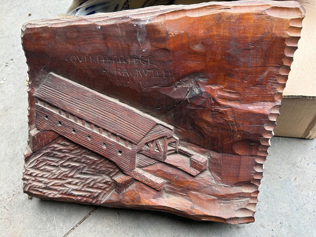 Wooden carved plaque of a covered bridge at Barrackville, WV