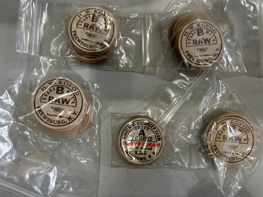 Assorted milk bottle caps