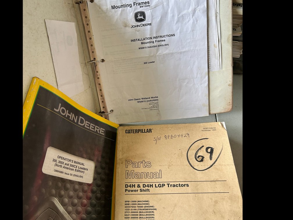 Operator's manual for John Deere 300, 300X, 300CX loaders, parts manual D4H tractors