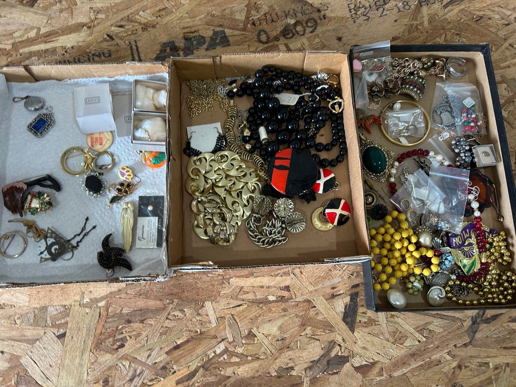 Costume jewelry pins, necklaces, earrings, bracelets