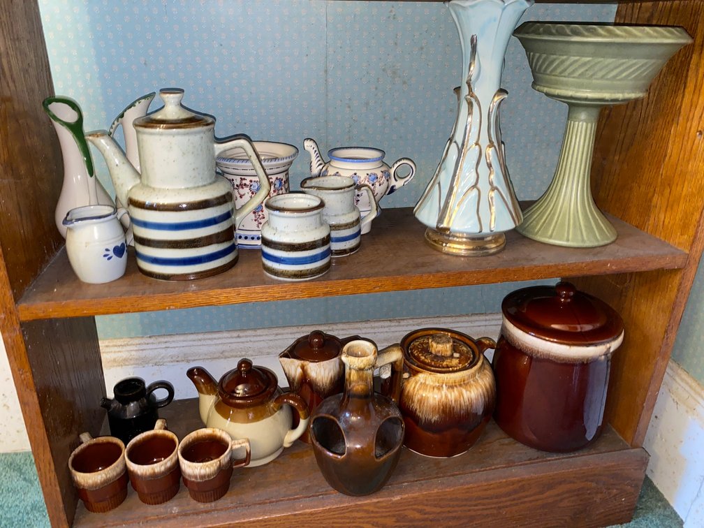 2-Shelves of Pottery